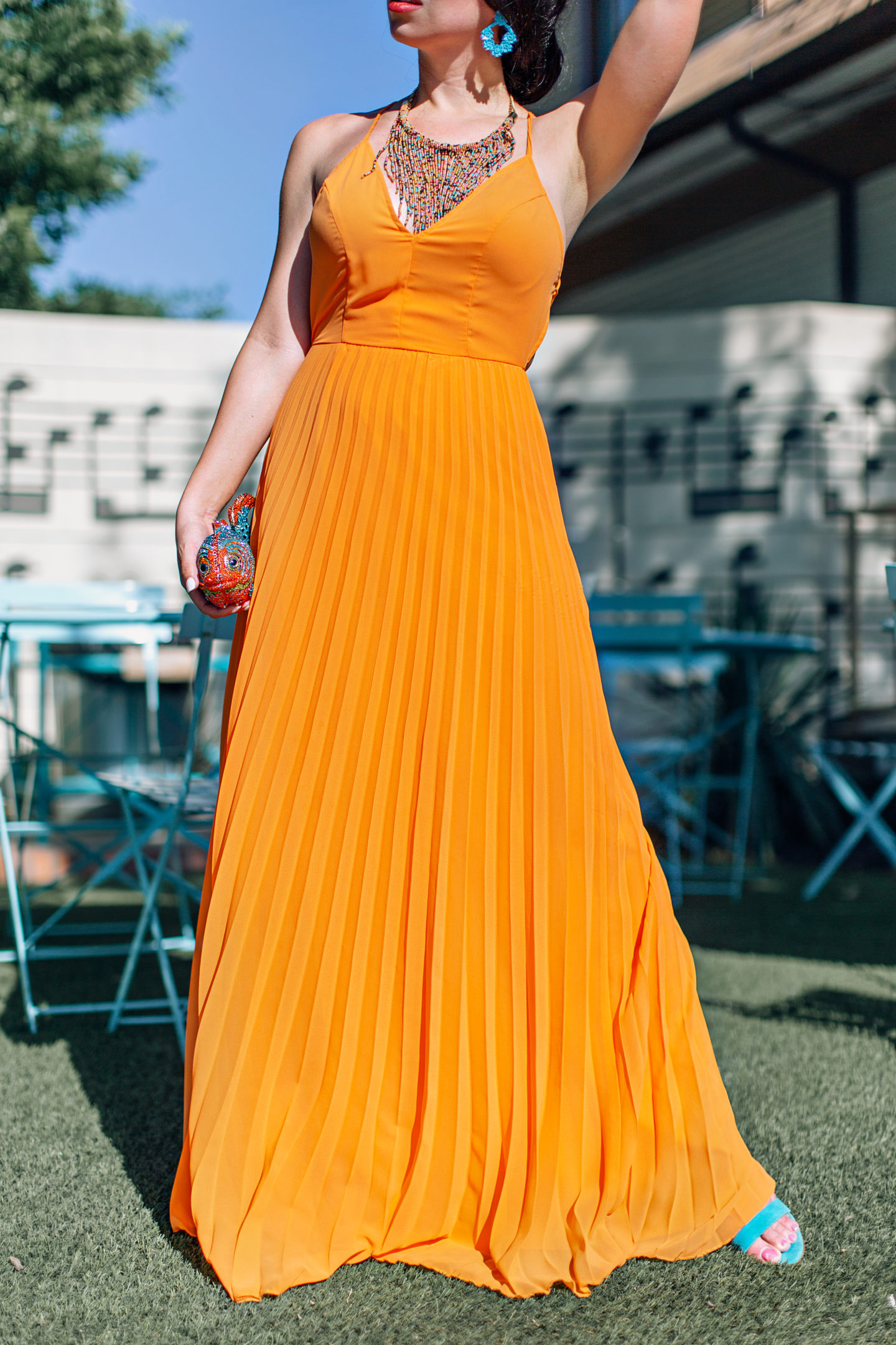 orange pleated dress